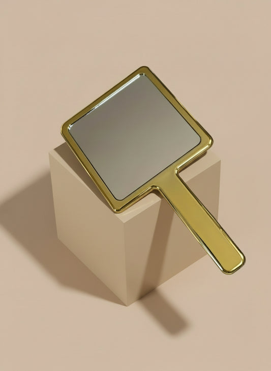 Gold handheld mirror